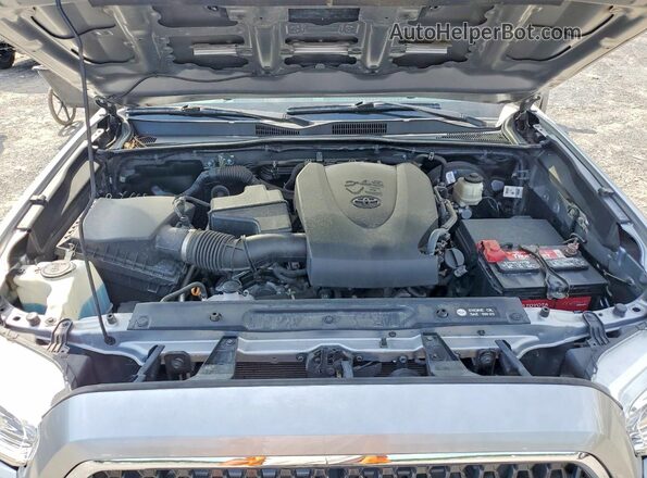 3TMCZ5AN4JM130016 2018 TOYOTA TACOMA Silver უკანა სალონის ხედი