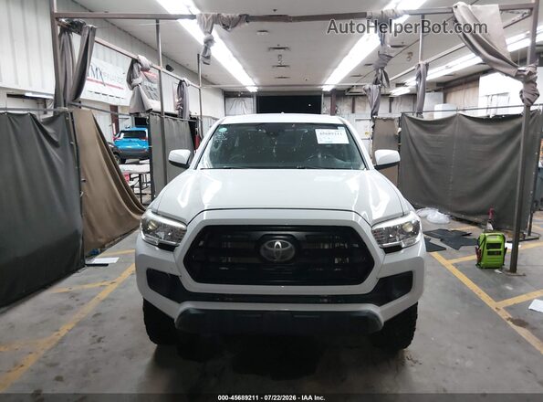 3TMCZ5AN4JM161802 2018 TOYOTA TACOMA White უკანა სალონის ხედი