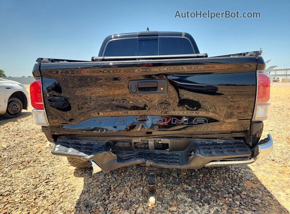 3TMCZ5AN4LM299522 2020 TOYOTA TACOMA Black Rear view