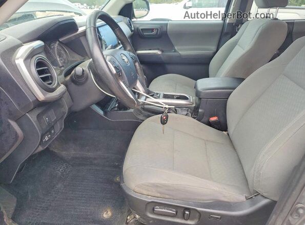 3TMCZ5AN4LM341395 2020 TOYOTA TACOMA Gray Front interior view