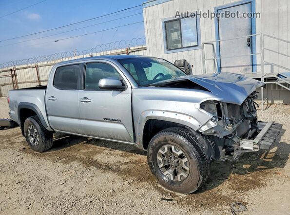 3TMCZ5AN4PM567586 2023 TOYOTA TACOMA Silver Передня права чверть