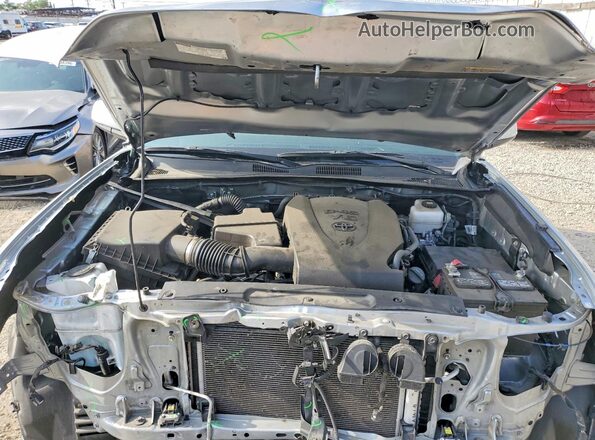 3TMCZ5AN4PM567586 2023 TOYOTA TACOMA Silver Вид задньої частини салону