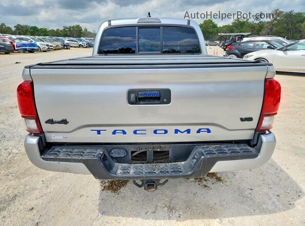3TMCZ5AN4PM578698 2023 TOYOTA TACOMA Silver Вид ззаду