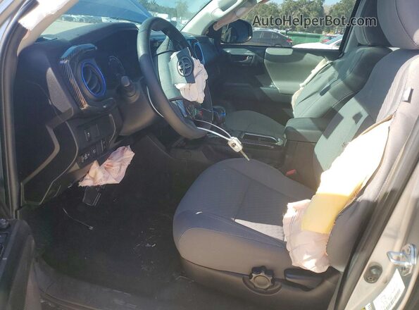 3TMCZ5AN4PM578698 2023 TOYOTA TACOMA Silver Вид салону спереду