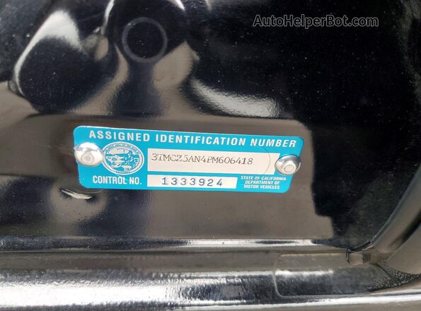 3TMCZ5AN4PM606418 2023 TOYOTA TACOMA Black Շարժիչի բաժամունքի տեսք
