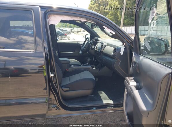 3TMCZ5AN4PM628421 2023 TOYOTA TACOMA Black Вид салону спереду