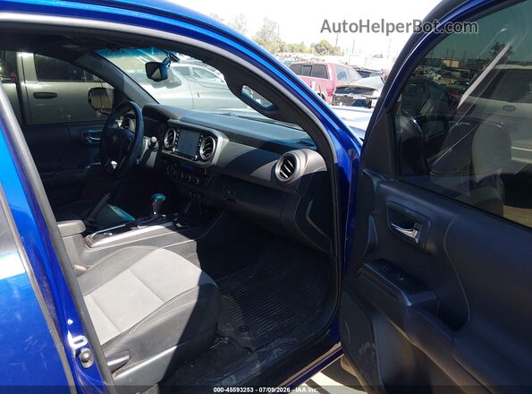 3TMCZ5AN4PM652072 2023 TOYOTA TACOMA Blue Вид салону спереду