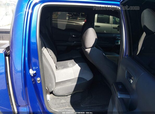 3TMCZ5AN4PM652072 2023 TOYOTA TACOMA Blue Вид наклейки з VIN-кодом