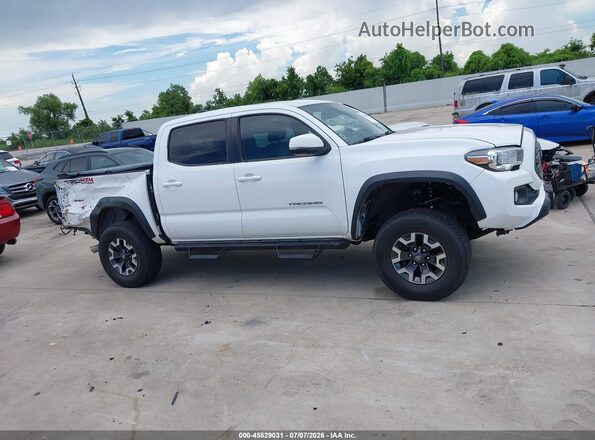 3TMCZ5AN5LM290604 2020 TOYOTA TACOMA White Widok wnętrza z tyłu