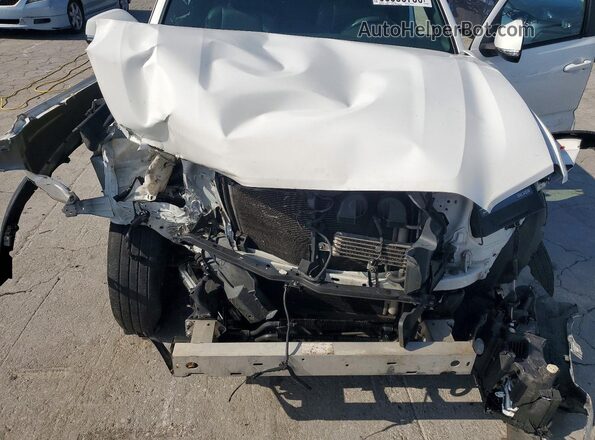 3TMCZ5AN5LM304064 2020 TOYOTA TACOMA White Widok wnętrza z tyłu