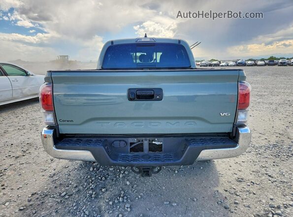 3TMCZ5AN5PM572554 2023 TOYOTA TACOMA Green Հետևի տեսք