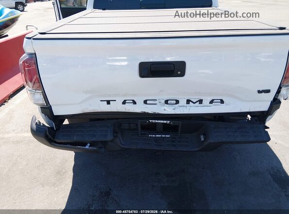 3TMCZ5AN5PM593744 2023 TOYOTA TACOMA Белый Вид спереди