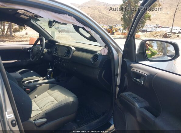 3TMCZ5AN6PM545010 2023 TOYOTA TACOMA Silver Vista interior delantera