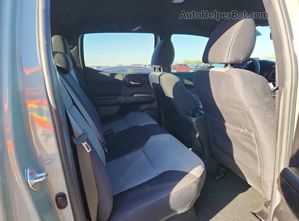 3TMCZ5AN6PM575852 2023 TOYOTA TACOMA Green Vista de los asientos traseros