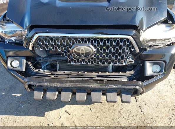 3TMCZ5AN7JM174690 2018 TOYOTA TACOMA Black Դիմացի տեսք