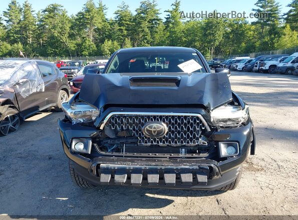 3TMCZ5AN7JM174690 2018 TOYOTA TACOMA Black Սալոնի հետևի տեսք