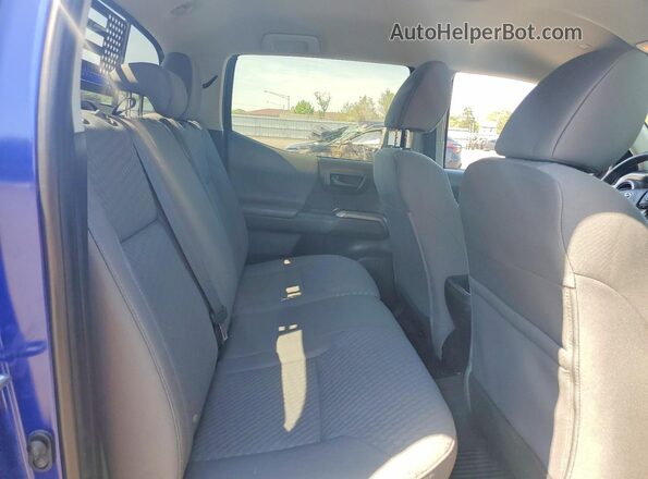 3TMCZ5AN7PM554086 2023 TOYOTA TACOMA Blue Vista de los asientos traseros