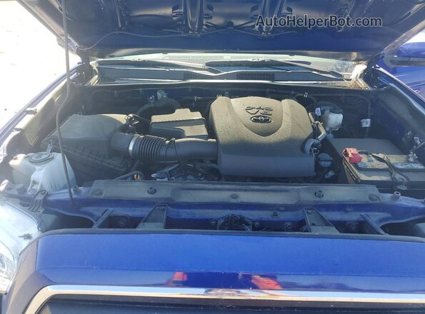 3TMCZ5AN7PM554086 2023 TOYOTA TACOMA Blue Vista interior trasera