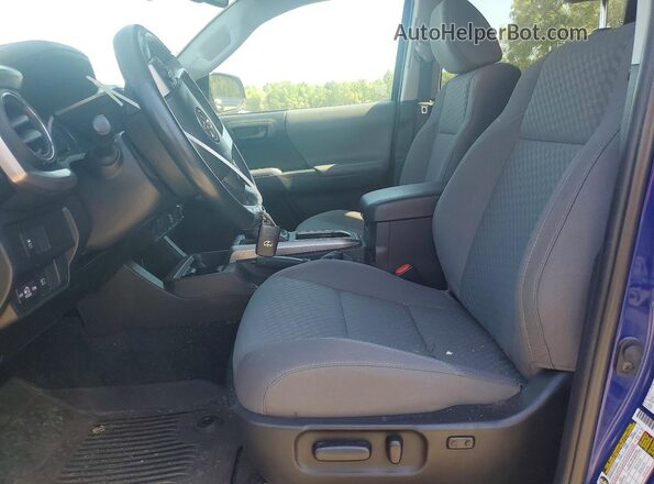 3TMCZ5AN7PM554086 2023 TOYOTA TACOMA Blue Vista interior delantera