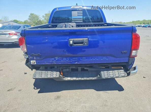 3TMCZ5AN7PM554086 2023 TOYOTA TACOMA Blue Vista trasera