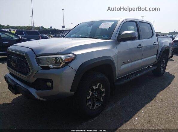 3TMCZ5AN8JM174889 2018 TOYOTA TACOMA Silver წინა მარცხენა ხედი სამი მეოთხედიდან