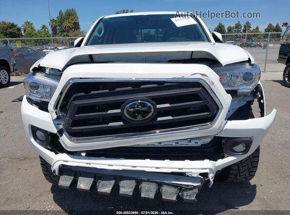 3TMCZ5AN8NM469223 2022 TOYOTA TACOMA White Դիմացի տեսք