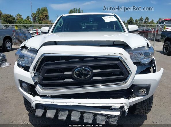 3TMCZ5AN8NM469223 2022 TOYOTA TACOMA White Սալոնի հետևի տեսք