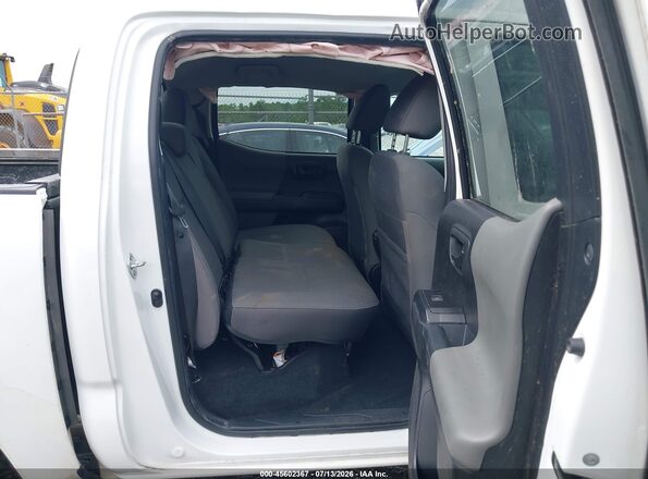 3TMCZ5AN8PM564321 2023 TOYOTA TACOMA White VIN կոդի պիտակի տեսք