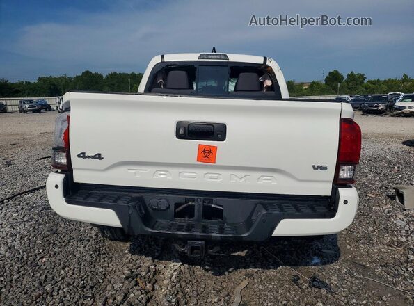 3TMCZ5AN8PM573066 2023 TOYOTA TACOMA White Rear view