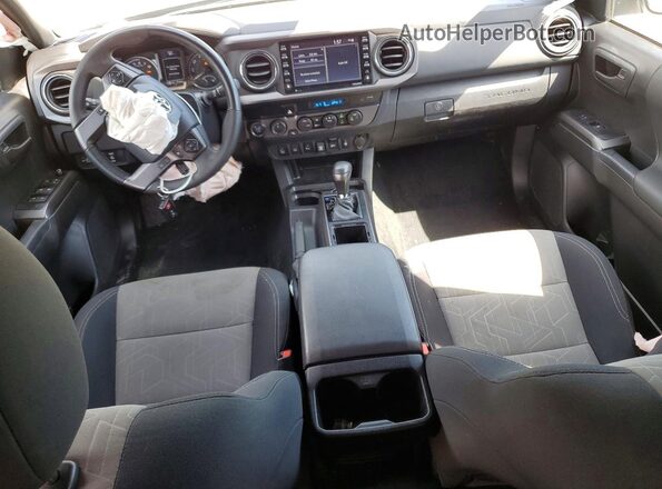 3TMCZ5AN8PM603702 2023 TOYOTA TACOMA White Widok deski rozdzielczej