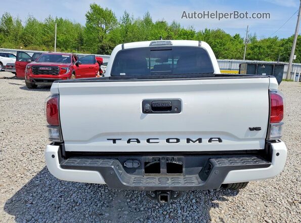 3TMCZ5AN8PM603702 2023 TOYOTA TACOMA White Widok z tyłu