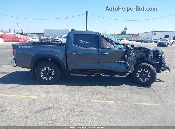 3TMCZ5AN8PM620144 2023 TOYOTA TACOMA Gray Widok wnętrza z tyłu