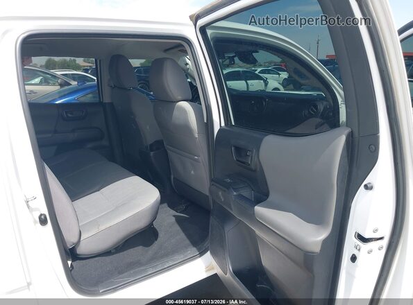 3TMCZ5AN9JM148897 2018 TOYOTA TACOMA White Widok naklejki z numerem VIN
