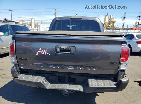 3TMCZ5AN9PM563338 2023 TOYOTA TACOMA Gray Հետևի տեսք