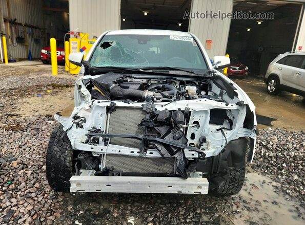 3TMCZ5AN9PM580673 2023 TOYOTA TACOMA White Դիմացի տեսք