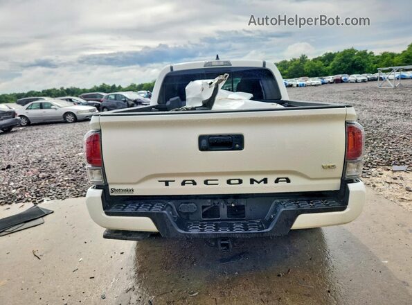 3TMCZ5AN9PM580673 2023 TOYOTA TACOMA White Հետևի տեսք