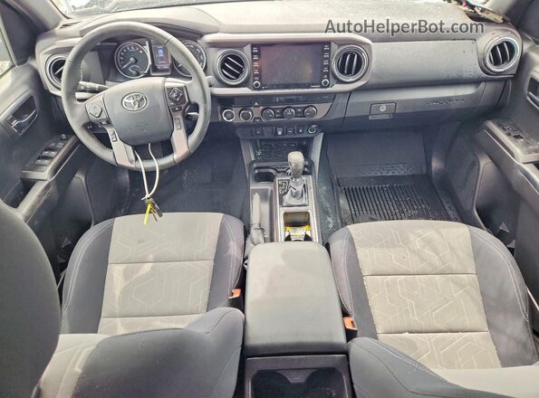 3TMCZ5AN9PM580673 2023 TOYOTA TACOMA White Առջևի վահանակի տեսք