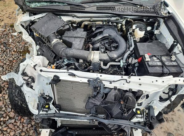 3TMCZ5AN9PM580673 2023 TOYOTA TACOMA White Սալոնի հետևի տեսք