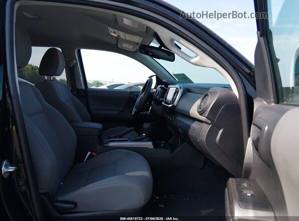 3TMCZ5AN9PM655047 2023 TOYOTA TACOMA Black Front interior view