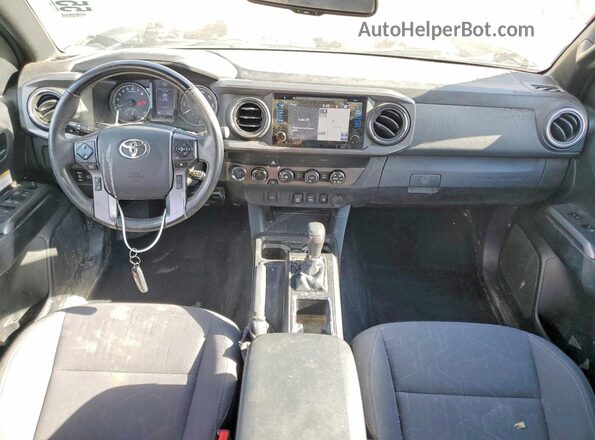 3TMCZ5ANXKM272792 2019 TOYOTA TACOMA Beige Вид панелі приладів
