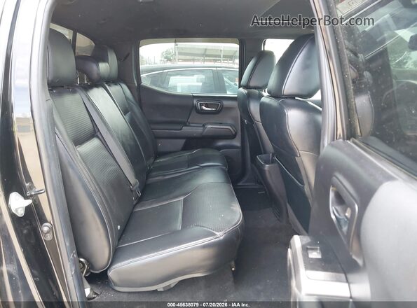 3TMCZ5ANXPM566023 2023 TOYOTA TACOMA Black VIN կոդի պիտակի տեսք