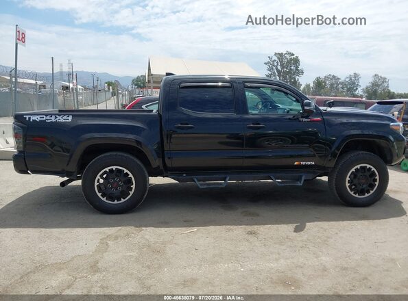 3TMCZ5ANXPM566023 2023 TOYOTA TACOMA Black Սալոնի հետևի տեսք