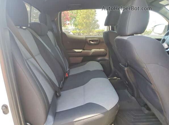 3TMCZ5ANXPM640220 2023 TOYOTA TACOMA White Rear seats view