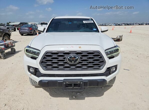 3TMDZ5BN1PM169125 2023 TOYOTA TACOMA White Դիմացի տեսք