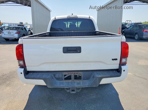 3TMDZ5BN2KM073383 2019 TOYOTA TACOMA White Вид ззаду