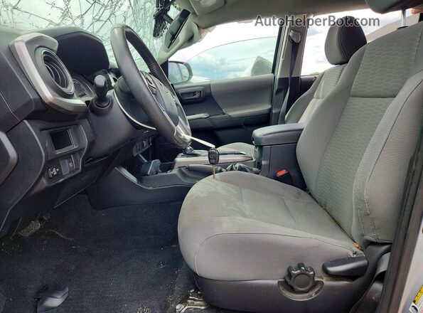 3TMDZ5BN3KM068466 2019 TOYOTA TACOMA Silver Вид салону спереду