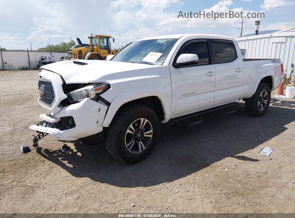3TMDZ5BN4JM053988 2018 TOYOTA TACOMA White Vista tres cuartos delantera izquierda