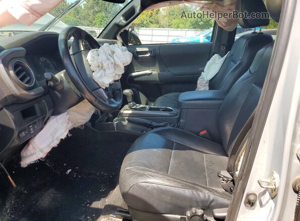 3TMDZ5BN4KM068962 2019 TOYOTA TACOMA Silver Front interior view