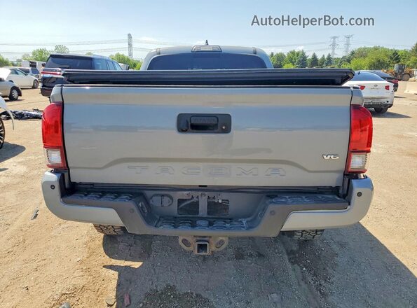 3TMDZ5BN4KM068962 2019 TOYOTA TACOMA Silver Rear view