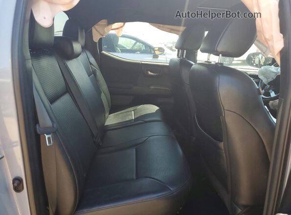 3TMDZ5BN4KM068962 2019 TOYOTA TACOMA Silver Rear seats view